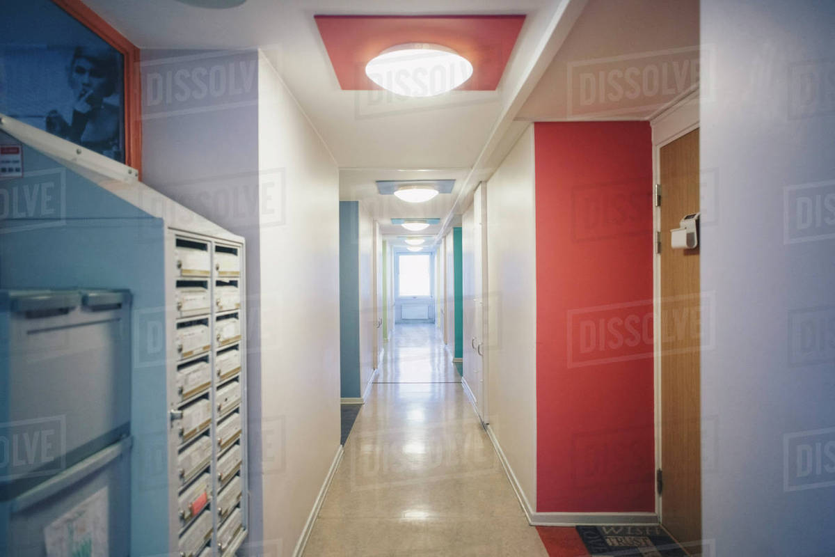 Interior of empty corridor in college dorm - Stock Photo - Dissolve