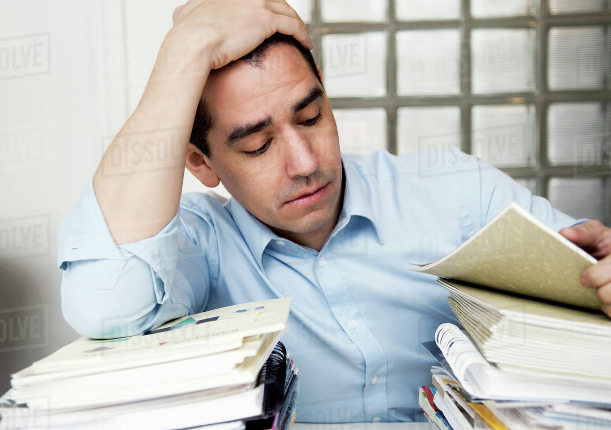 Exhausted businessman Stock Photo Dissolve