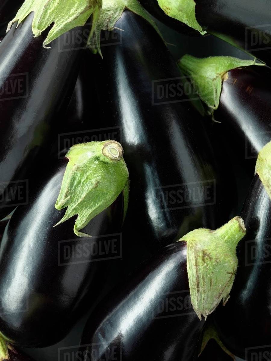 Aubergines, whole Stock Photo Dissolve