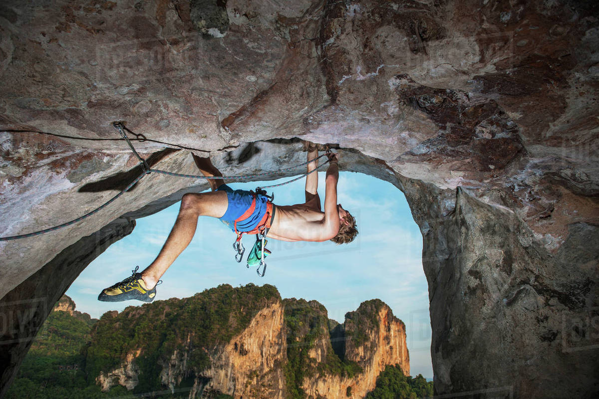 Rock Climber Climbing On Burnt Offerings Tonsai Railay Beach Rock Climber Climbing On Burnt Offerings Tonsai Railay Beach Krabi Thailand