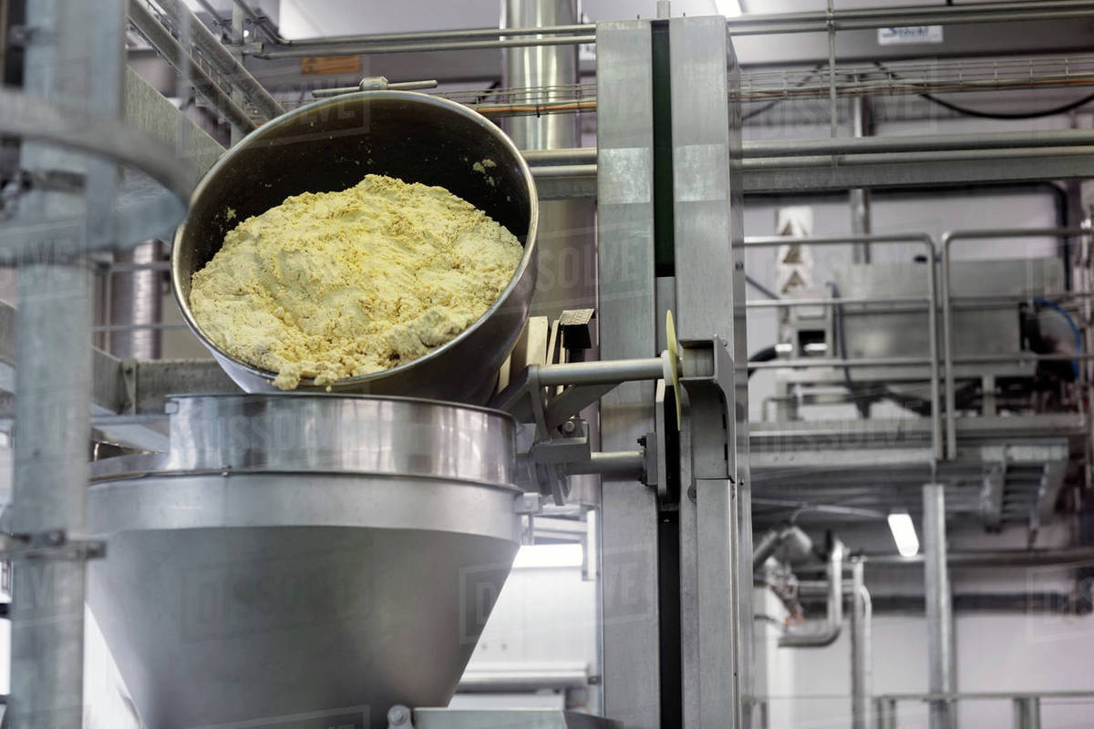 Machinery in organic tofu production factory Stock Photo Dissolve