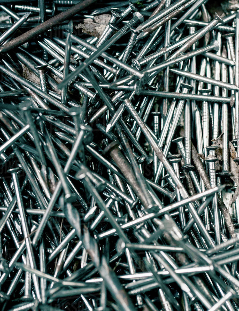 Variety of nails and screws Stock Photo Dissolve