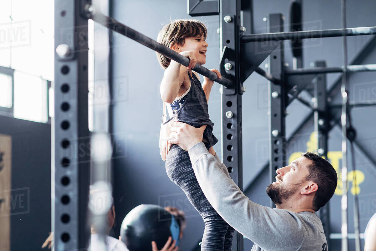father and daughter using