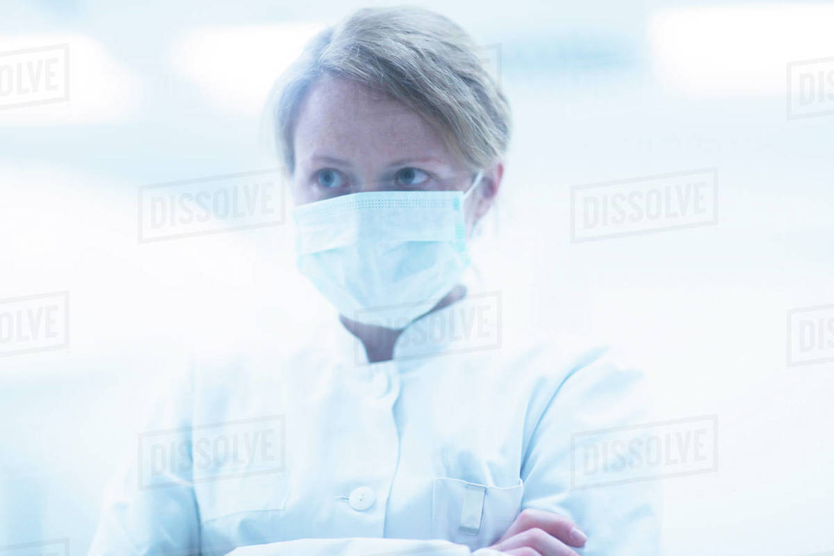 Portrait of radiologist wearing surgical mask Stock Photo Dissolve