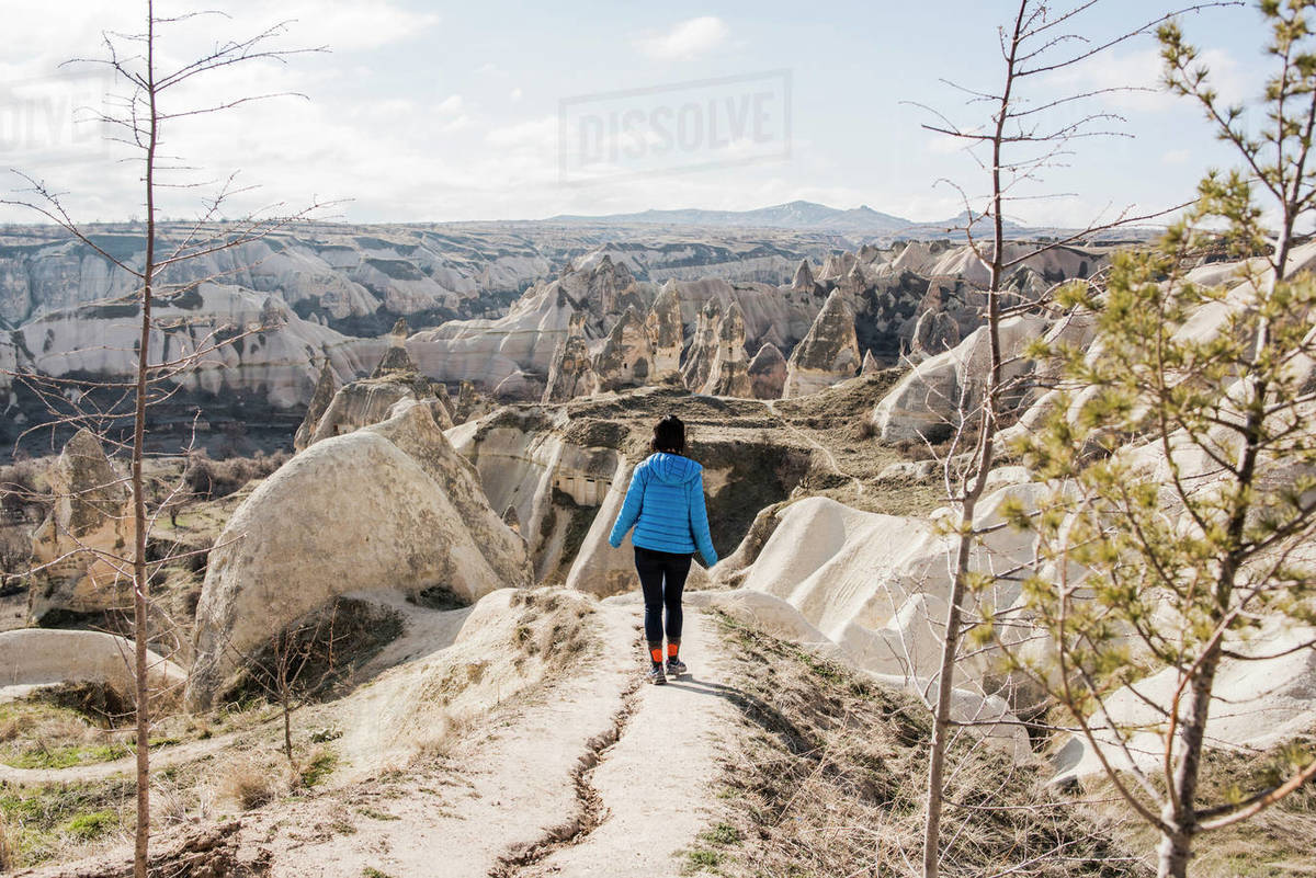 Woman hiking in rocky valley, Göreme, Cappadocia, Nevsehir, Turkey Royalty-free stock photo