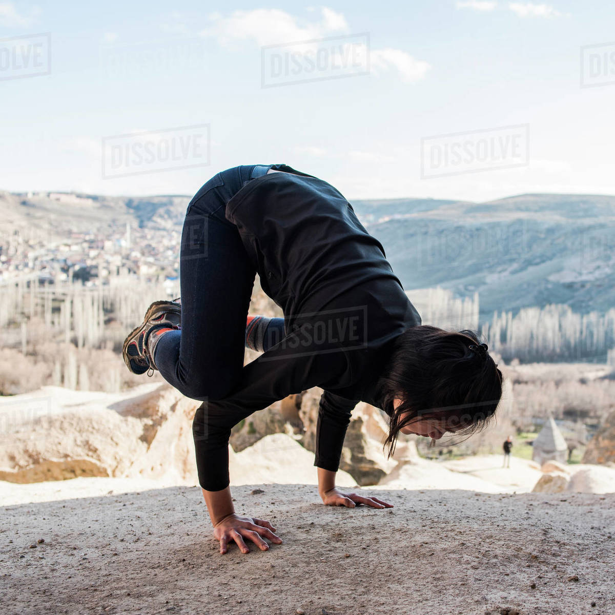 Woman practising yoga in Selime Monastery, Göreme, Cappadocia, Nevsehir, Turkey Royalty-free stock photo