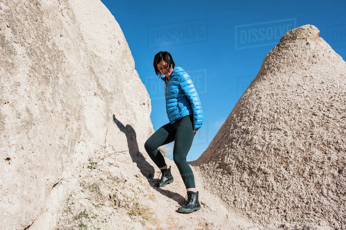 Woman exploring Uchisar Castle, Göreme, Cappadocia, Nevsehir, Turkey Royalty-free stock photo