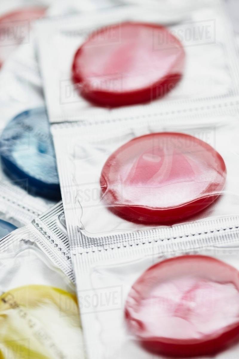 Close up of colorful condoms Stock Photo Dissolve