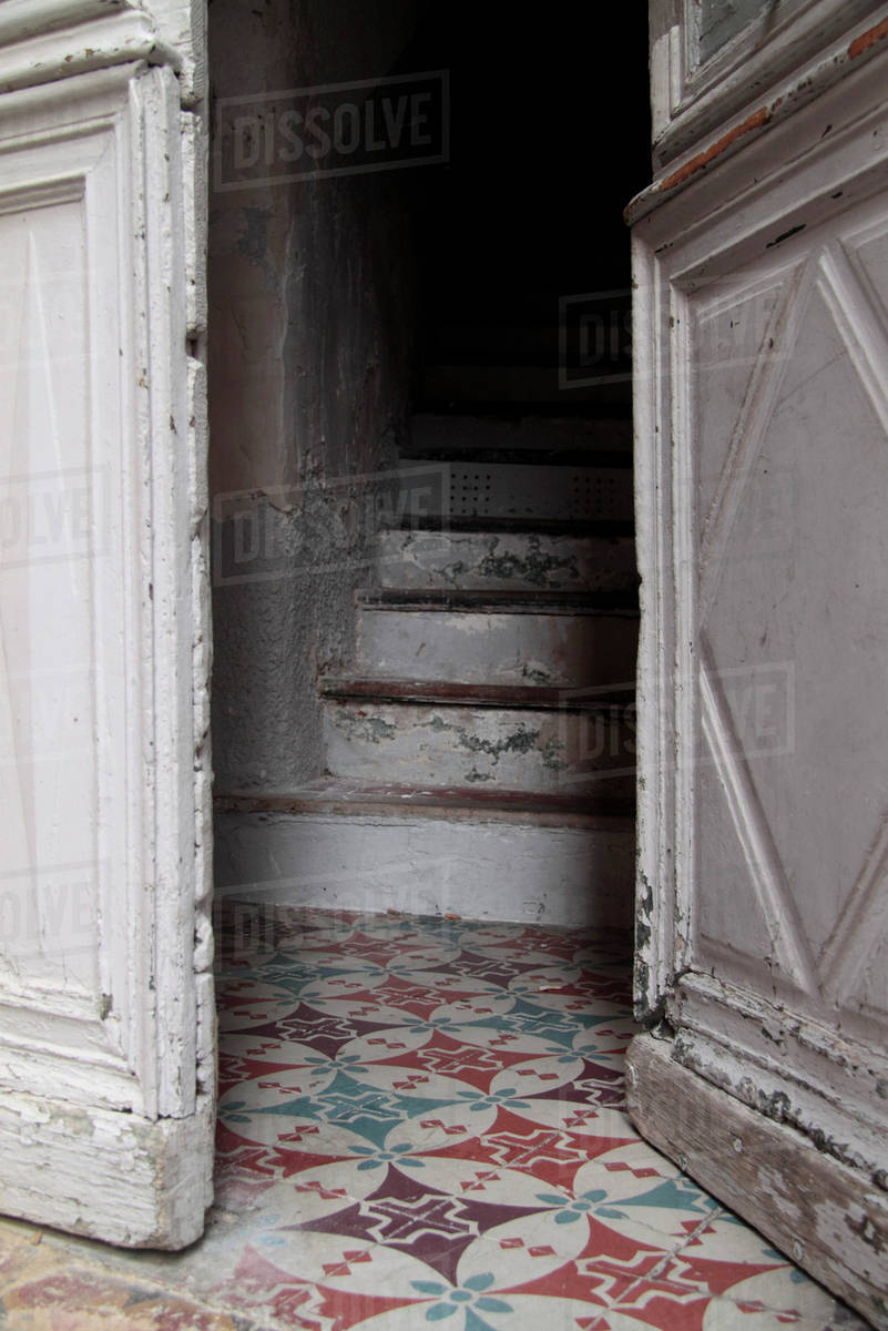 Half Open Door Leading To Stairway Stock Photo Dissolve Half Open Door Leading To Stairway