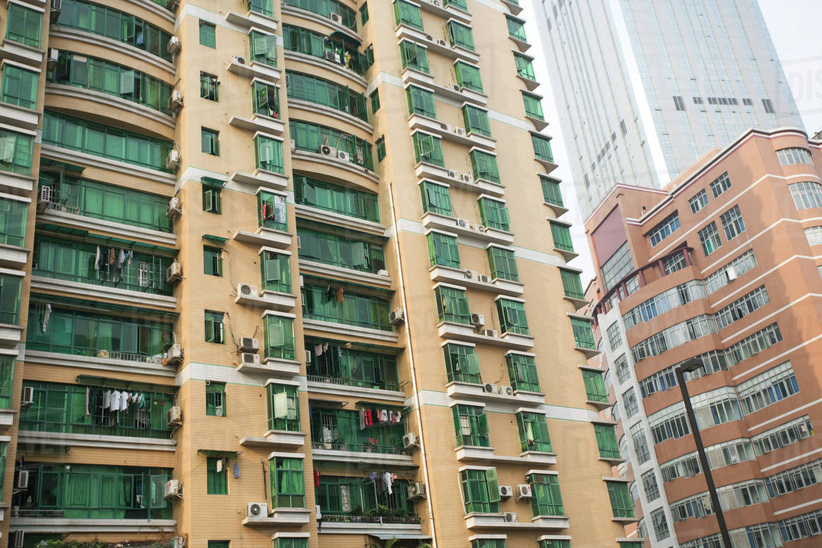 China, Guangdong Province, Guangzhou, high rise apartment building with