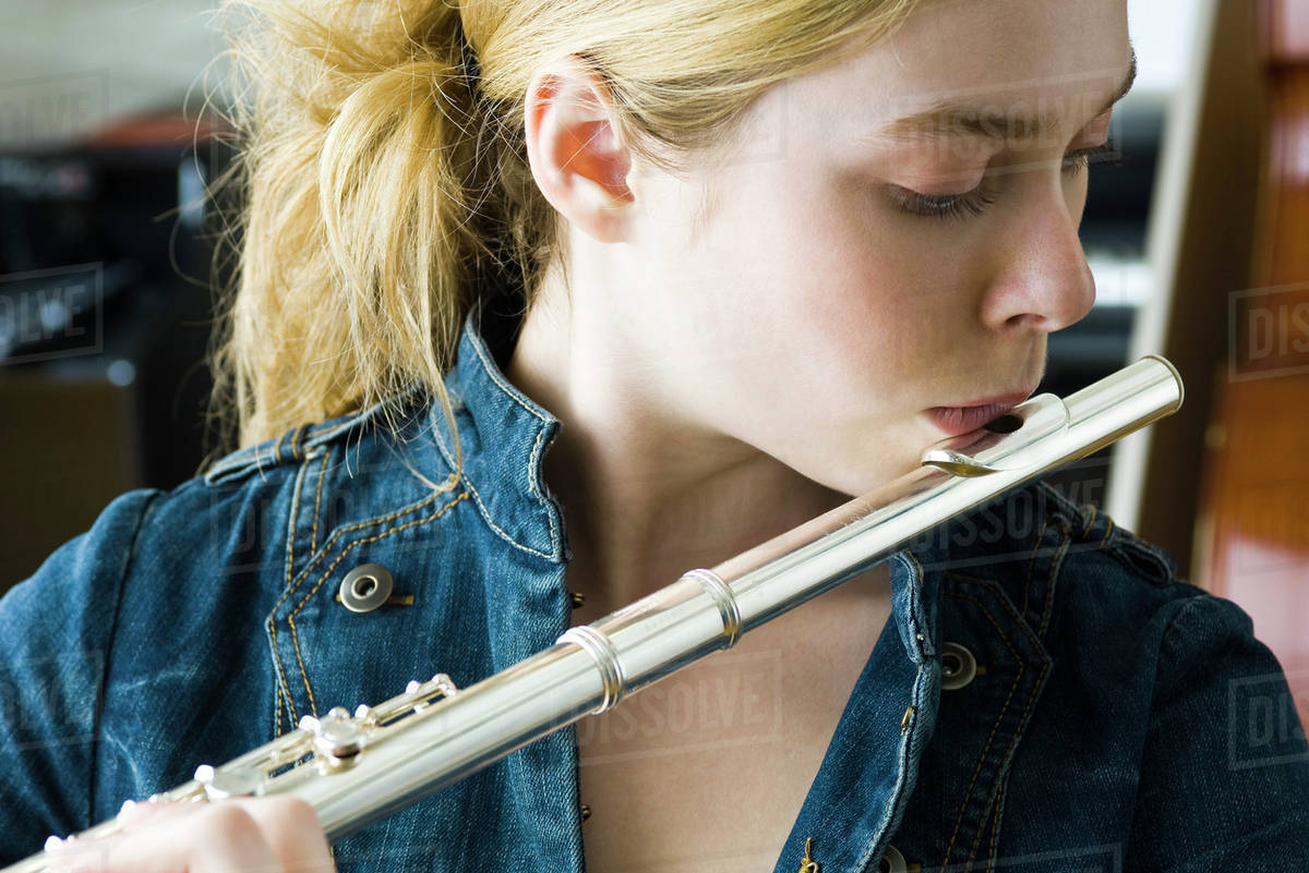 Flautist practicing Stock Photo Dissolve