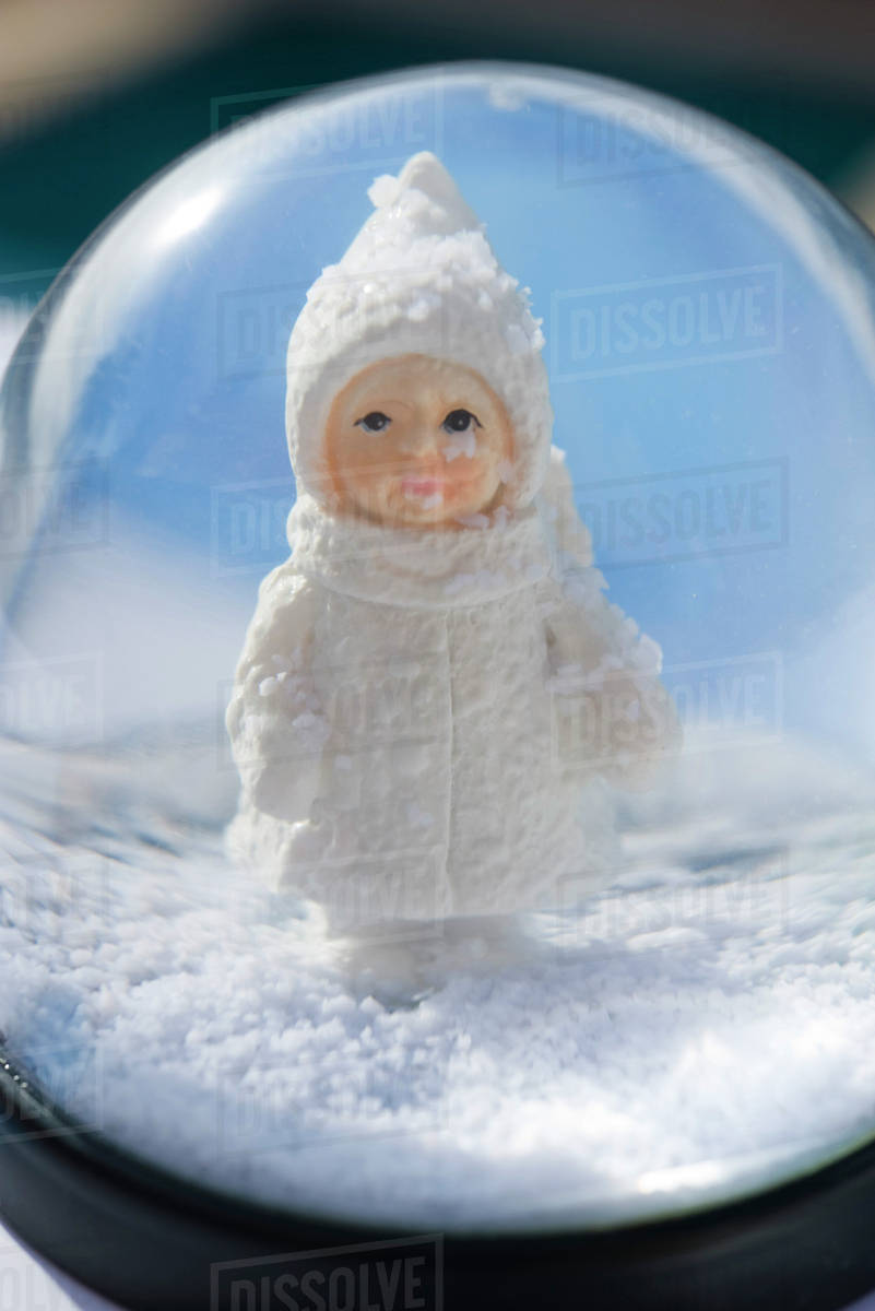 little girl snow globe