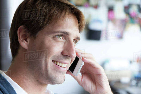 Man using cell phone - Royalty-free Stock Photo | Dissolve