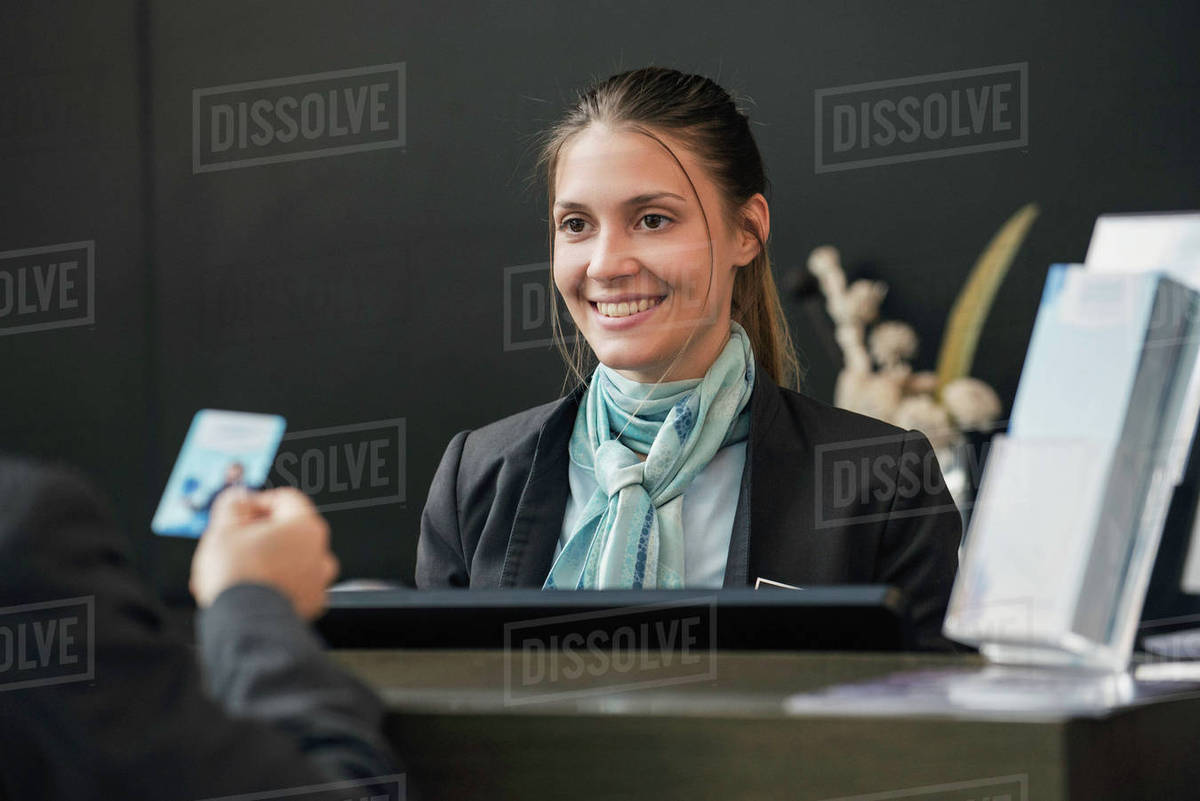 Bank Teller Helping Customer Stock Photo Dissolve