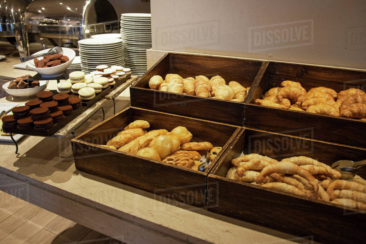 Assorted pastries on buffet Stock Photo Dissolve