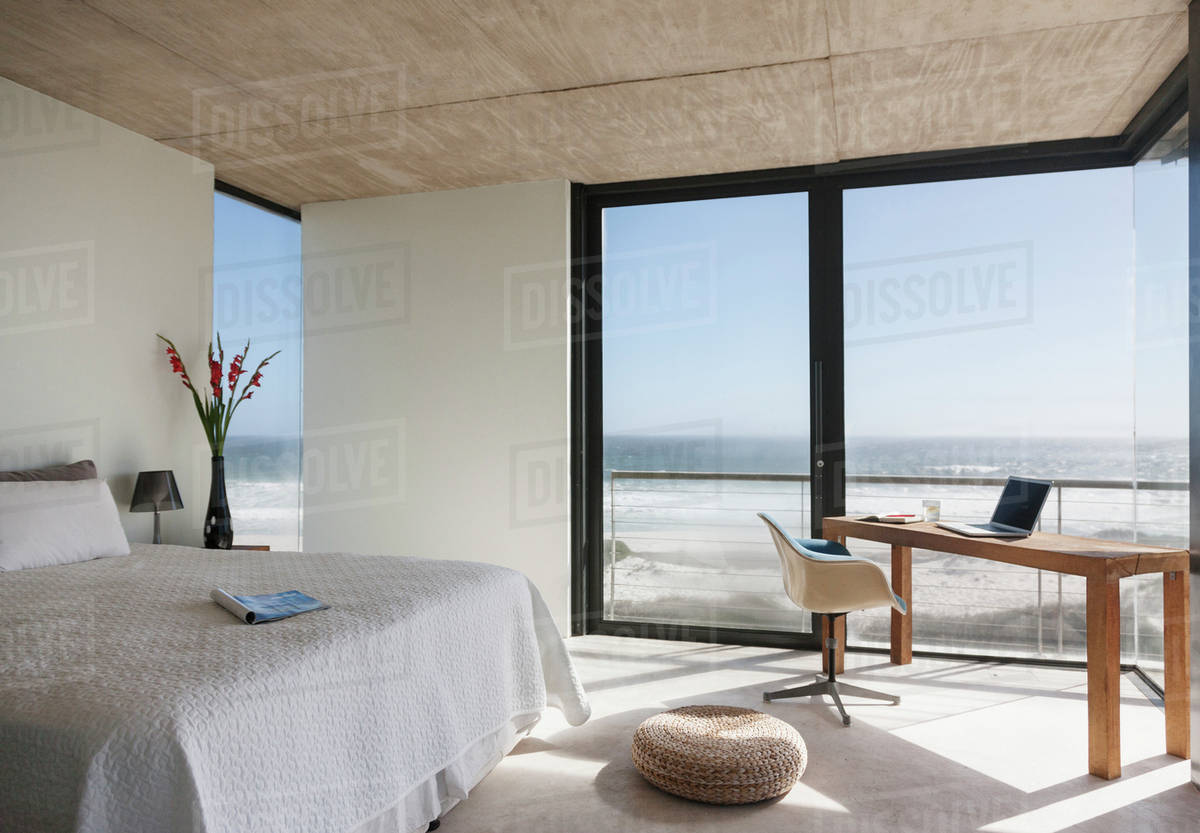 Modern bedroom overlooking ocean Stock Photo Dissolve