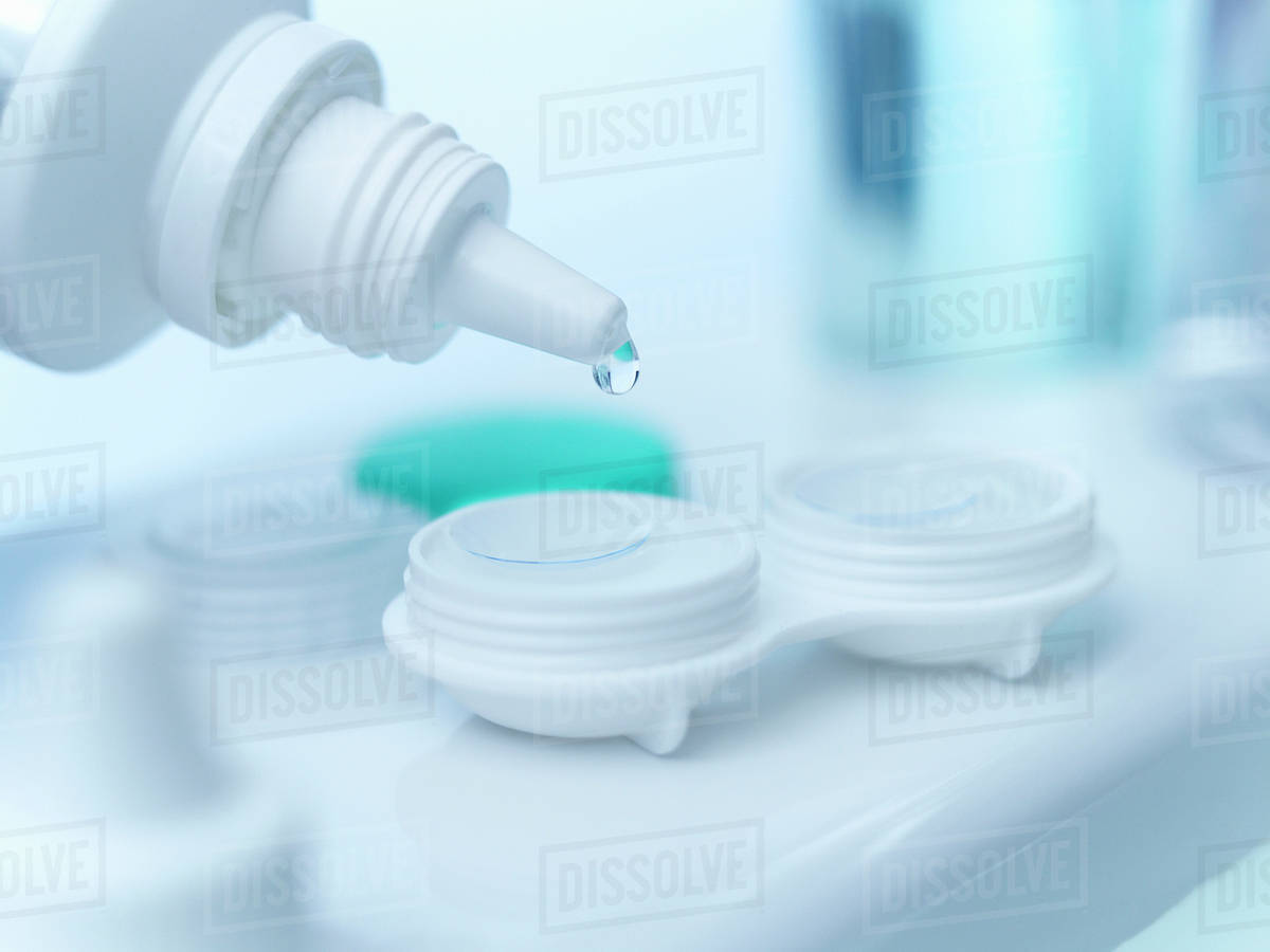 Closeup of saline dropping on contact lens Stock Photo Dissolve