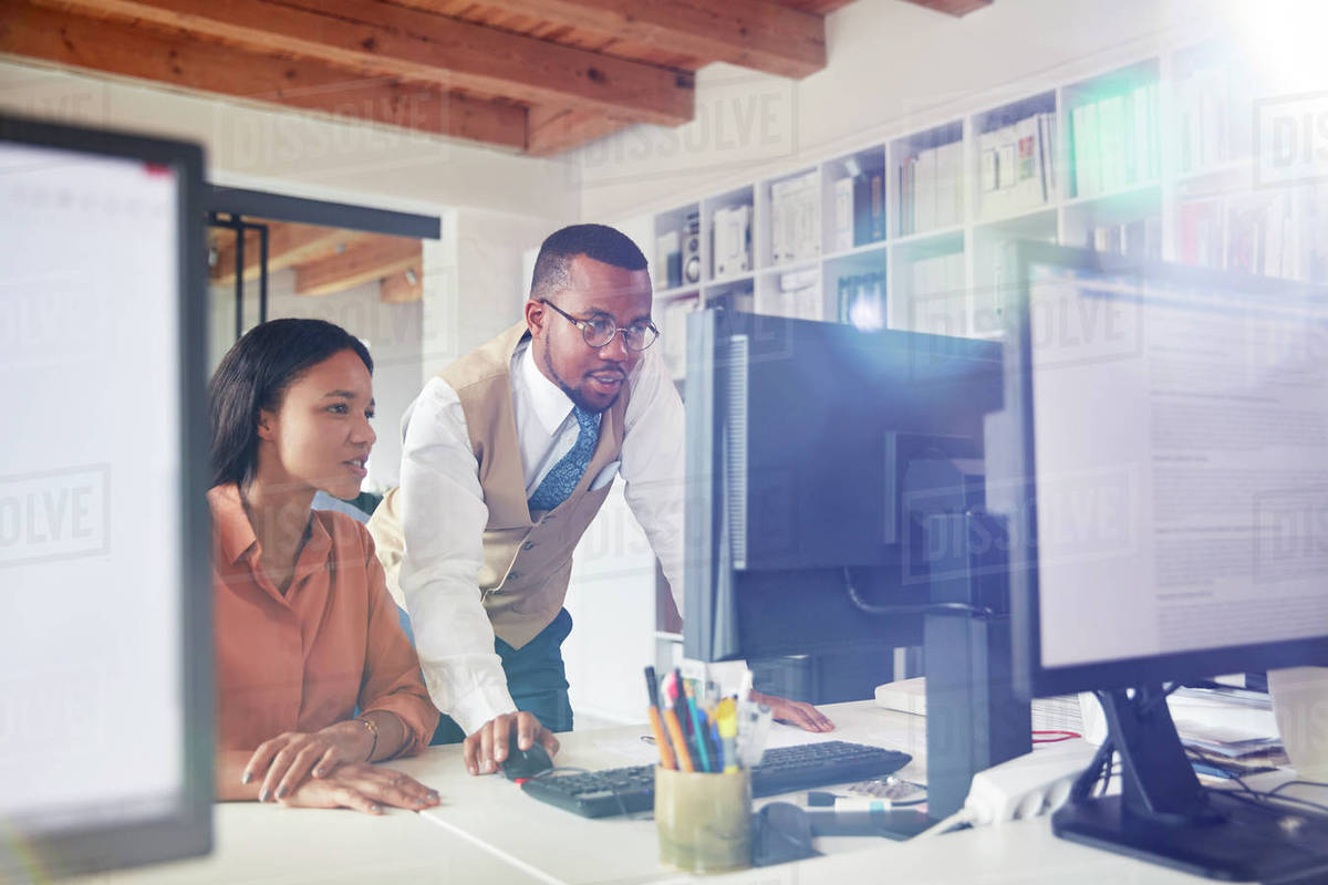 Business people using computer in office - Royalty-free Stock Photo ...