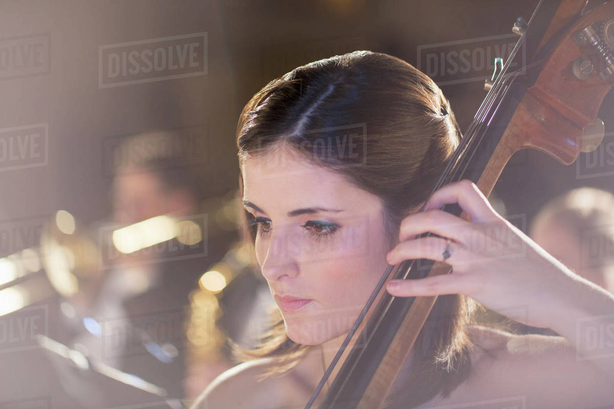 Double bassist performing Stock Photo Dissolve
