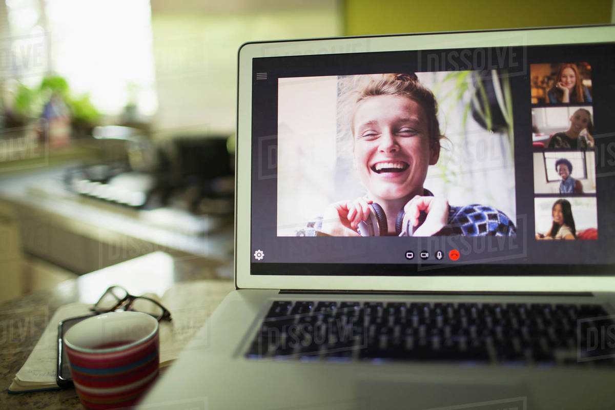Happy women friends video conferencing on laptop screen - Stock Photo ...