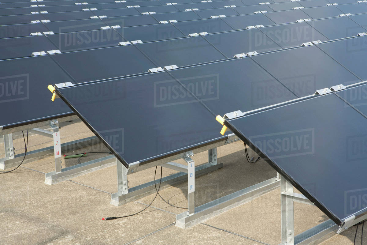 Detail of solar panels in rows - Stock Photo - Dissolve
