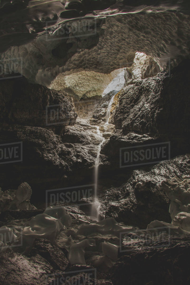Water flowing through rock - Royalty-free Stock Photo | Dissolve
