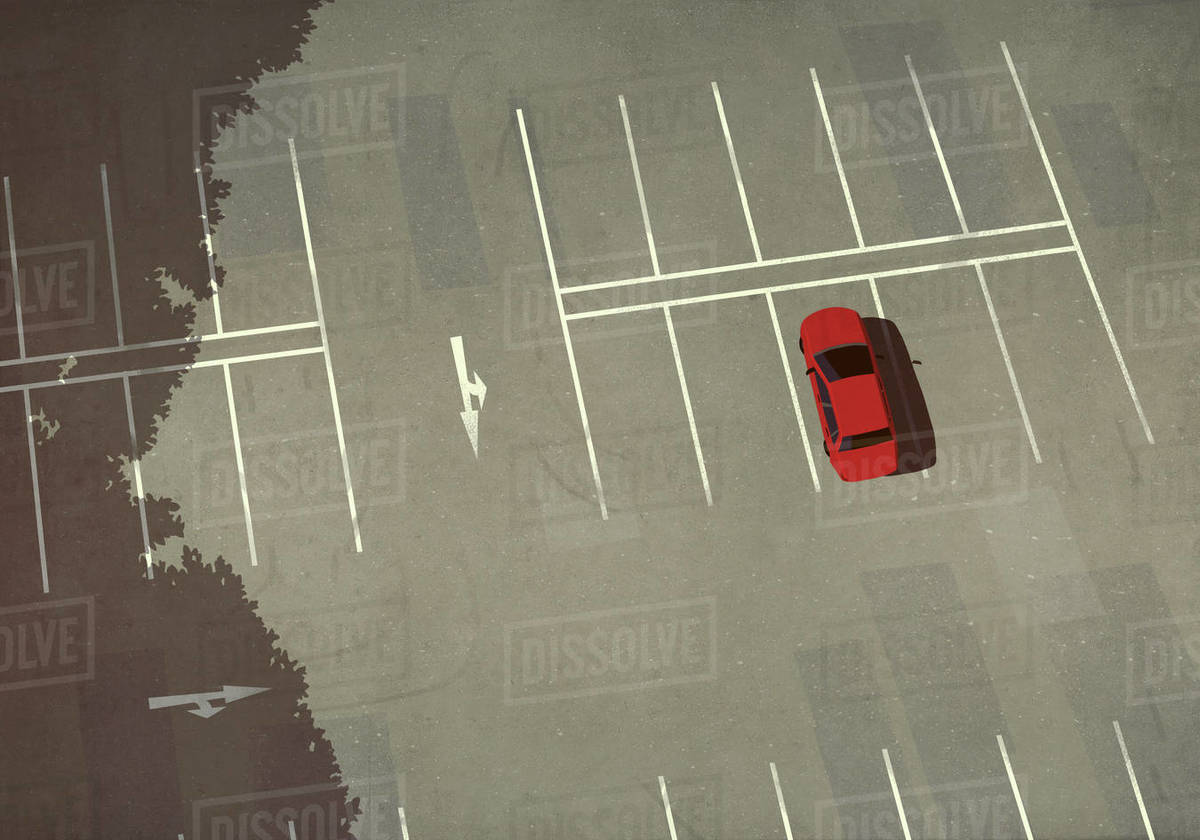 Aerial view red car parked in parking lot Stock Photo Dissolve